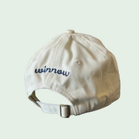 Beige cap with winnow embroidery on back